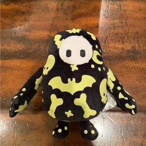 Black and Yellow Stuffed Animal Toy